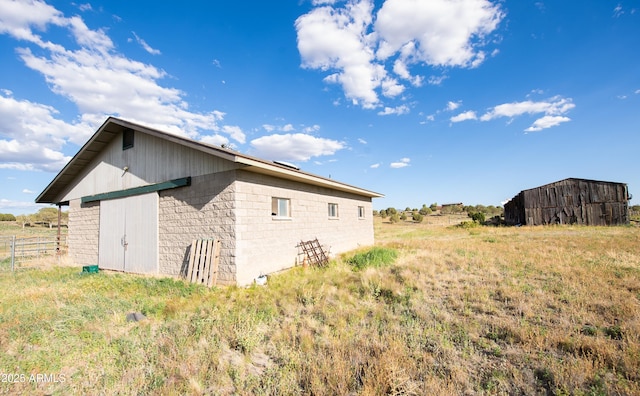 19125 N Lower Territory Rd, Prescott, AZ 86305 - view of home's exterior with an outbuilding and concrete block siding