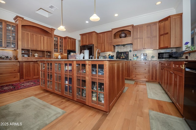 19125 N Lower Territory Rd, Prescott, AZ 86305 - kitchen featuring black appliances, light wood-style flooring, ornamental molding, glass insert cabinets, and tasteful backsplash