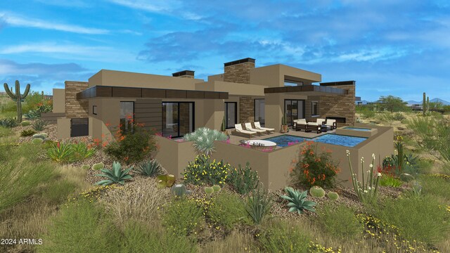 view of front of house with a chimney and stucco siding