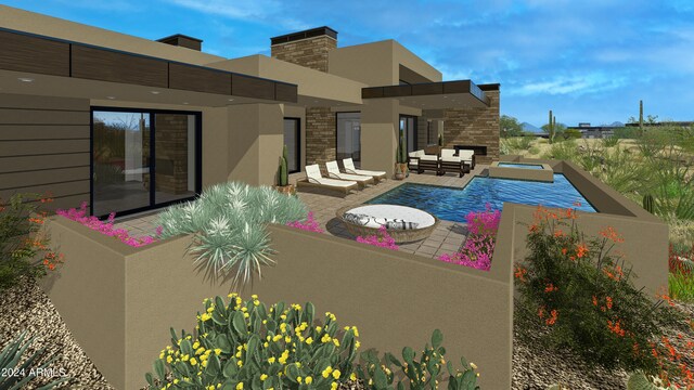 rear view of house with an outdoor hangout area and a patio area