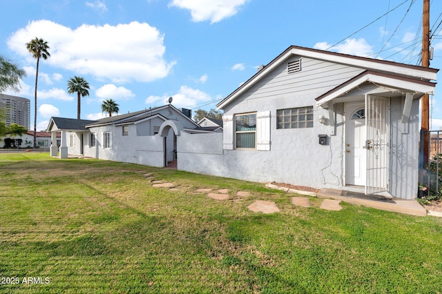 exterior space with a yard