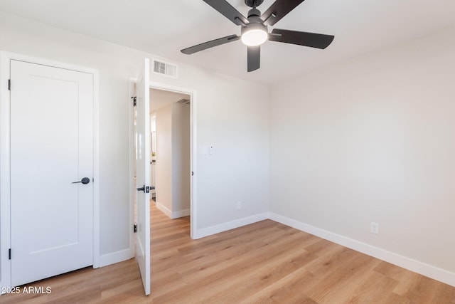 1061 E Fremont Dr, Tempe, AZ 85282 - unfurnished room featuring a ceiling fan and light wood-style flooring