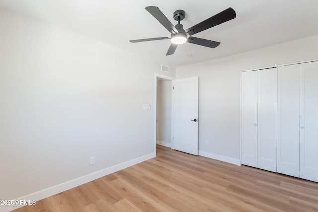 1061 E Fremont Dr, Tempe, AZ 85282 - unfurnished bedroom featuring light wood-type flooring, a closet, and ceiling fan
