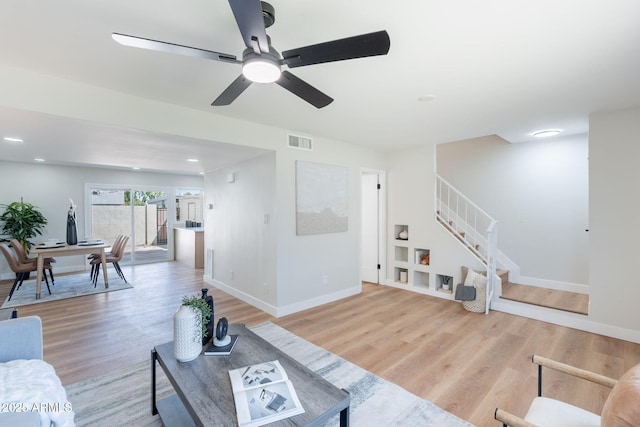 1061 E Fremont Dr, Tempe, AZ 85282 - living room with stairs, wood finished floors, and a ceiling fan
