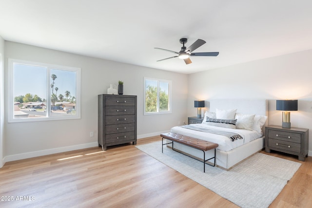 1061 E Fremont Dr, Tempe, AZ 85282 - bedroom with light wood-style floors and ceiling fan