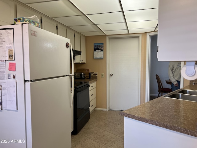 kitchen featuring sink, ventilation hood, light tile patterned floors, white refrigerator, and black range with electric stovetop