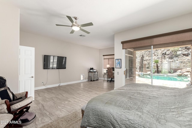 14058 S 24th Way, Phoenix, AZ 85048 - bedroom with access to outside and a ceiling fan