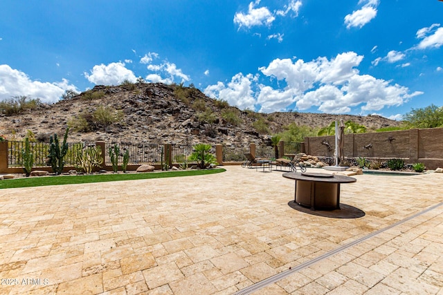 14058 S 24th Way, Phoenix, AZ 85048 - view of patio with a mountain view and a fire pit