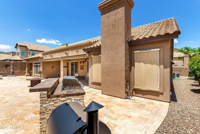 14058 S 24th Way, Phoenix, AZ 85048 - view of patio / terrace with area for grilling