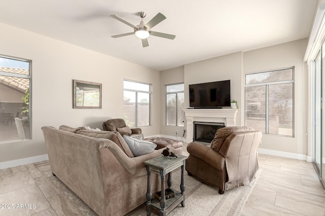 14058 S 24th Way, Phoenix, AZ 85048 - living area with ceiling fan and a fireplace