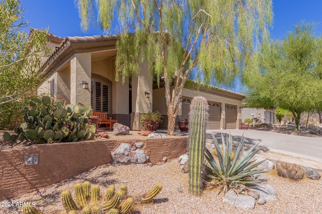 view of front of property featuring a garage