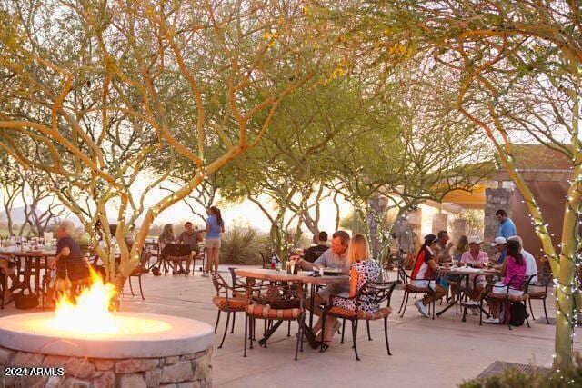 view of patio featuring a fire pit