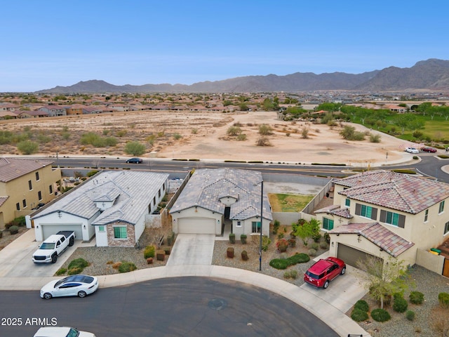 bird's eye view with a mountain view and a residential view