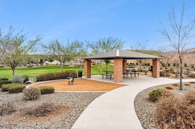 view of home's community featuring a gazebo and a yard