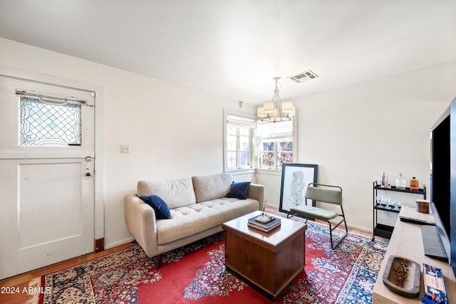 living room with a chandelier