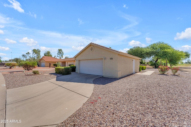 22609 S 214th Way, Queen Creek, AZ 85142 - view of front of home with concrete driveway, a garage, stucco siding, and a tiled roof