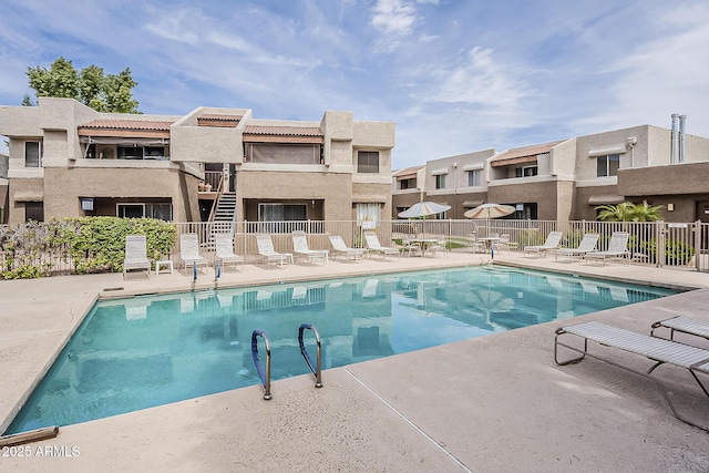 4554 E Paradise Village Pkwy N Unit 249, Phoenix, AZ 85032 - pool with fence and a patio area