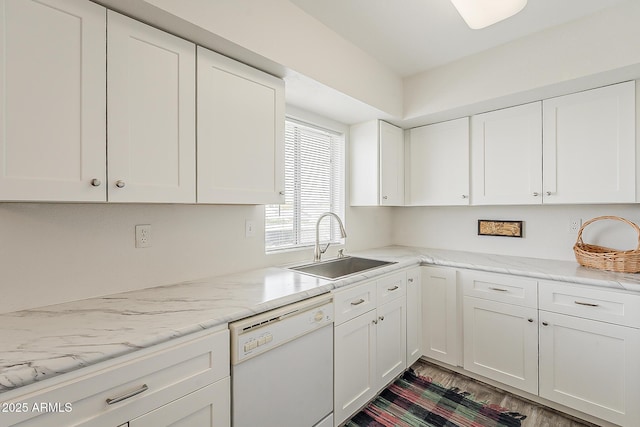 4554 E Paradise Village Pkwy N Unit 249, Phoenix, AZ 85032 - kitchen featuring a sink, white cabinetry, wood finished floors, and dishwasher