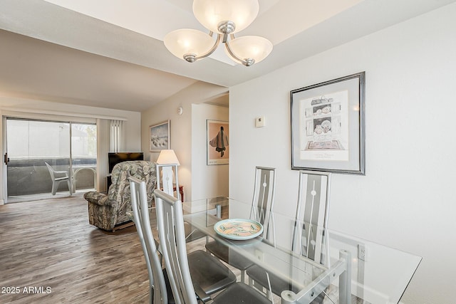 4554 E Paradise Village Pkwy N Unit 249, Phoenix, AZ 85032 - dining area featuring an inviting chandelier and wood finished floors