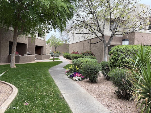 4554 E Paradise Village Pkwy N Unit 249, Phoenix, AZ 85032 - exterior space featuring a yard