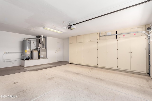 garage featuring a garage door opener, gas water heater, and heating unit