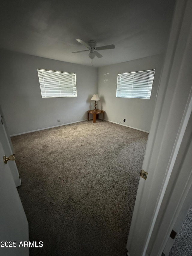 5517 E Boise St, Mesa, AZ 85205 - carpeted spare room with ceiling fan and baseboards