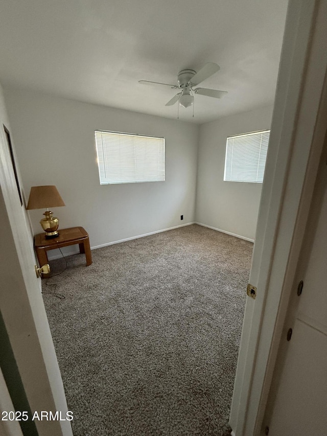 5517 E Boise St, Mesa, AZ 85205 - carpeted empty room featuring a ceiling fan and baseboards