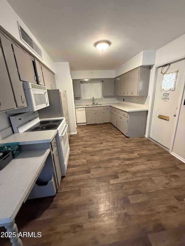 5517 E Boise St, Mesa, AZ 85205 - kitchen featuring gray cabinets, white appliances, a sink, dark wood-style floors, and light countertops