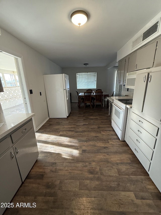 5517 E Boise St, Mesa, AZ 85205 - kitchen featuring white appliances, dark wood-style floors, and gray cabinetry