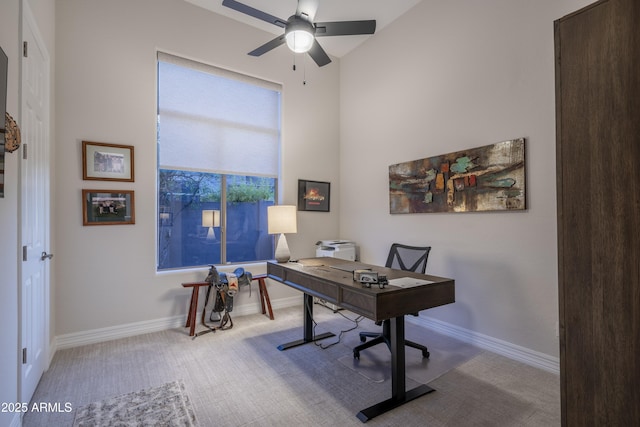 office area featuring ceiling fan and lofted ceiling