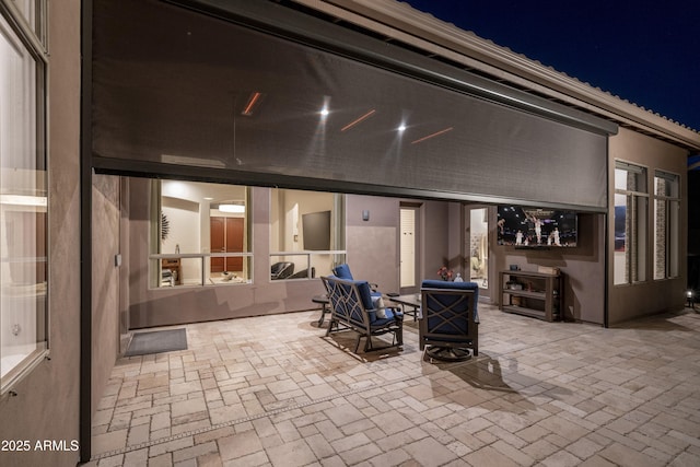 view of patio at twilight