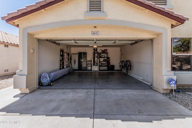 garage featuring driveway