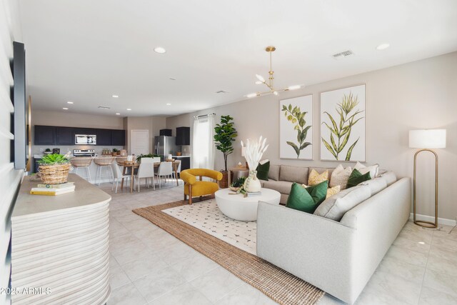 living room featuring an inviting chandelier