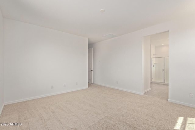 12358 W Marguerite Ave, Avondale, AZ 85323 - unfurnished room featuring visible vents, light carpet, and baseboards