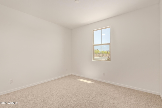 12358 W Marguerite Ave, Avondale, AZ 85323 - empty room with baseboards and carpet floors