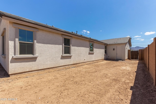 12358 W Marguerite Ave, Avondale, AZ 85323 - rear view of property with a fenced backyard and stucco siding