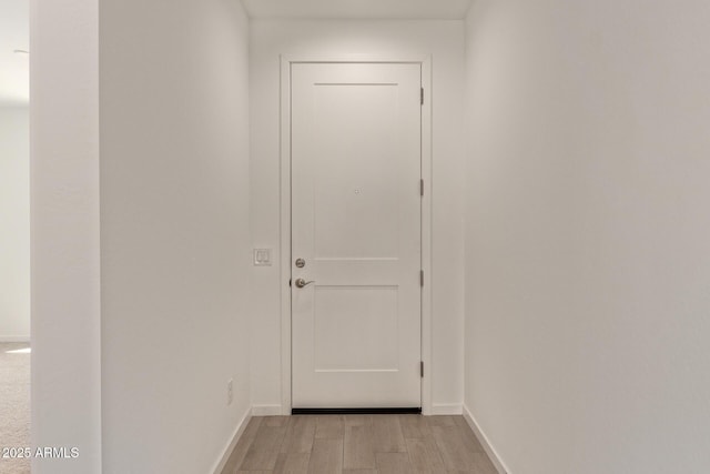 12358 W Marguerite Ave, Avondale, AZ 85323 - doorway featuring light wood-type flooring and baseboards