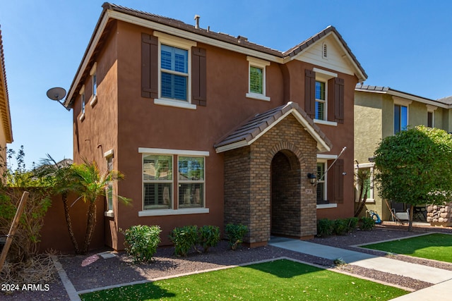 view of front of property with a front yard