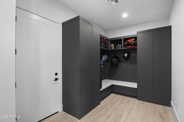 mudroom featuring visible vents and light wood-type flooring