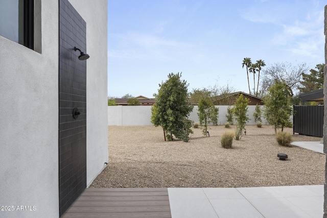 view of yard with a fenced backyard
