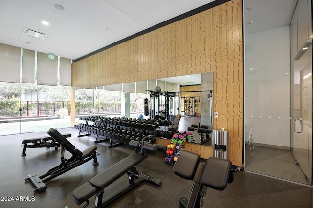 workout area with a wall of windows