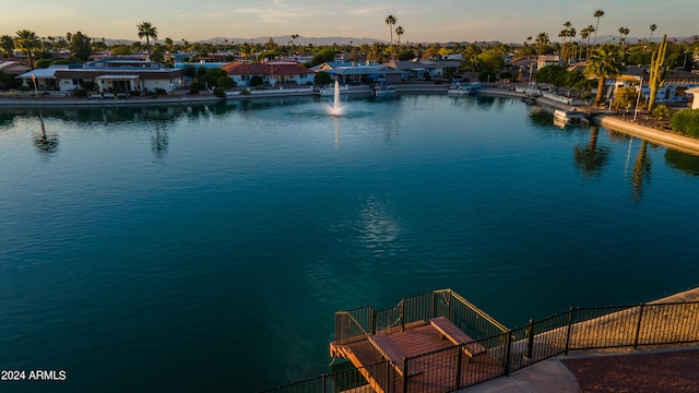 exterior space with a water view