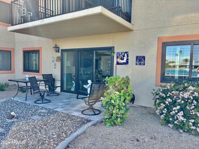 view of patio with a balcony