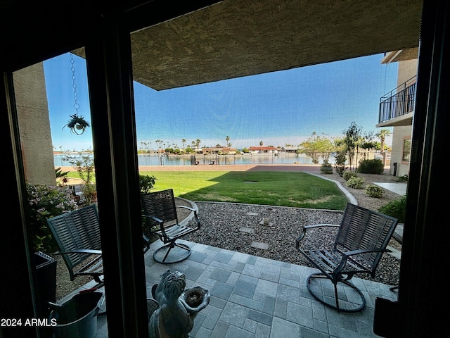 view of patio / terrace featuring a water view