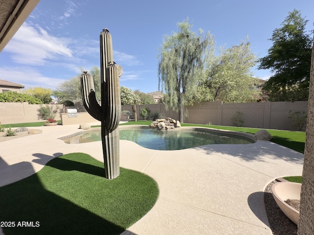 view of pool featuring a fenced backyard and a patio