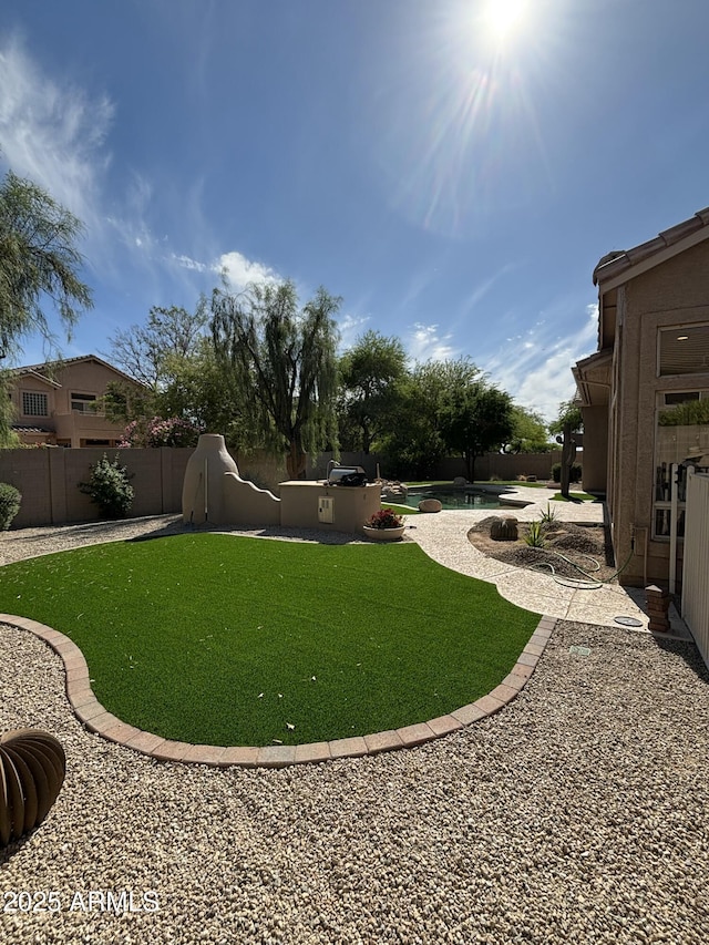 view of yard with a patio area