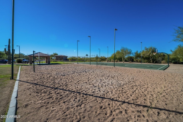 surrounding community featuring volleyball court, community basketball court, and a gazebo