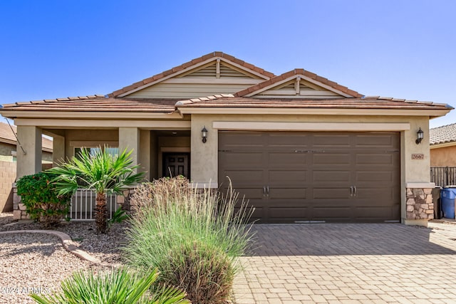 view of front of property with a garage