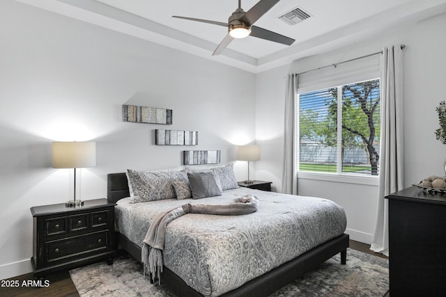 12228 E Wood Dr, Chandler, AZ 85249 - bedroom featuring visible vents, baseboards, ceiling fan, and wood finished floors