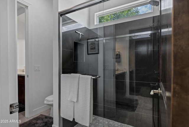 12228 E Wood Dr, Chandler, AZ 85249 - bathroom featuring toilet, a stall shower, vanity, and tile patterned flooring